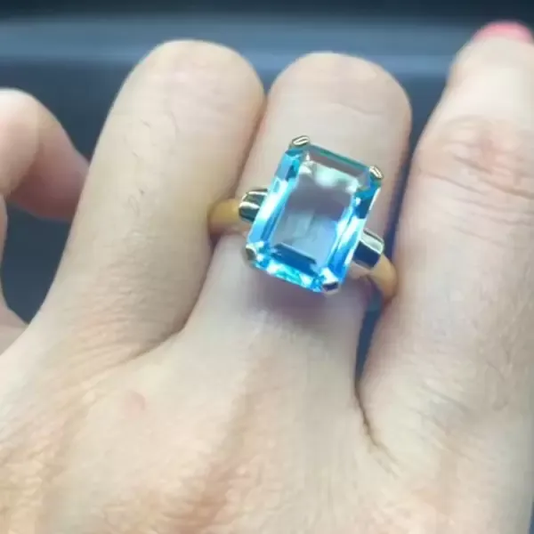 Emerald Cut Aquamarine Engagement Ring in Gold
